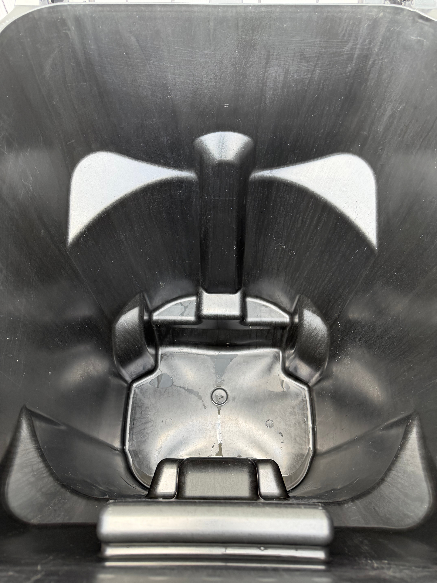 Trash bin — heavy grime after cleaning